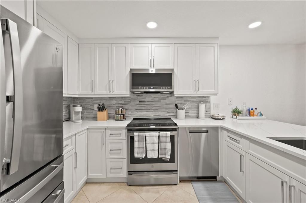 77 Emerald Woods Dr , Unit I6, Naples, FL 34108 Photo