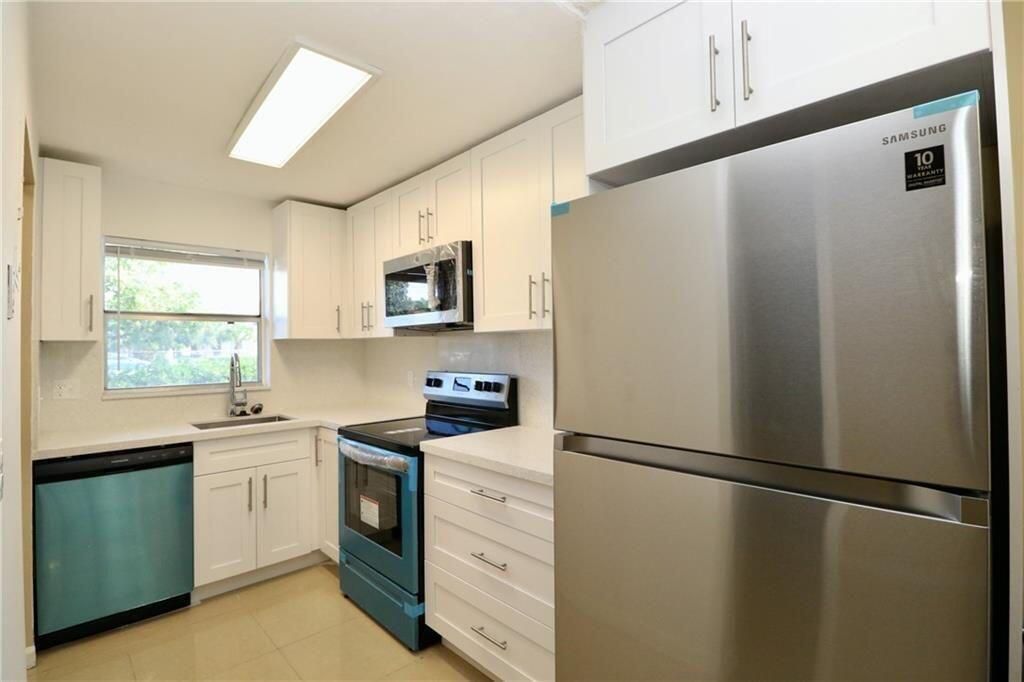 9915 Sandalfoot Boulevard, Unit 408, Boca Raton, FL 33428 Photo