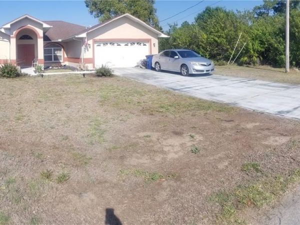 706 CANTERBURY CIRCLE , LEHIGH ACRES, FL 33974