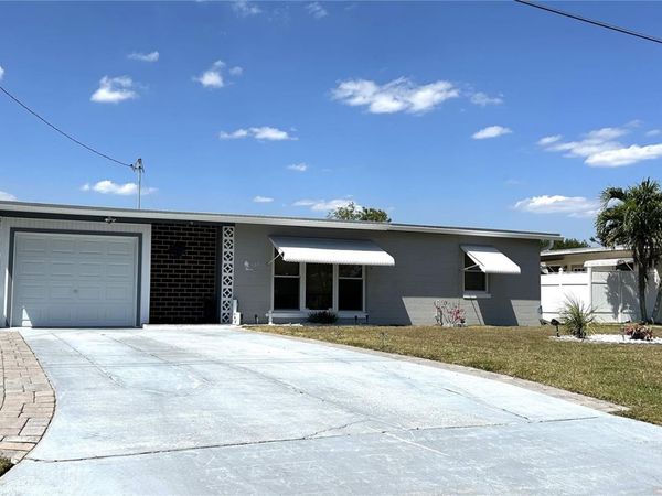 123 POINSETTIA CIRCLE NE, PORT CHARLOTTE, FL 33952