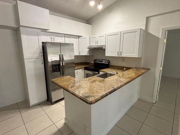 811 Lyons Road, Unit 20203, Coconut Creek, FL 33063