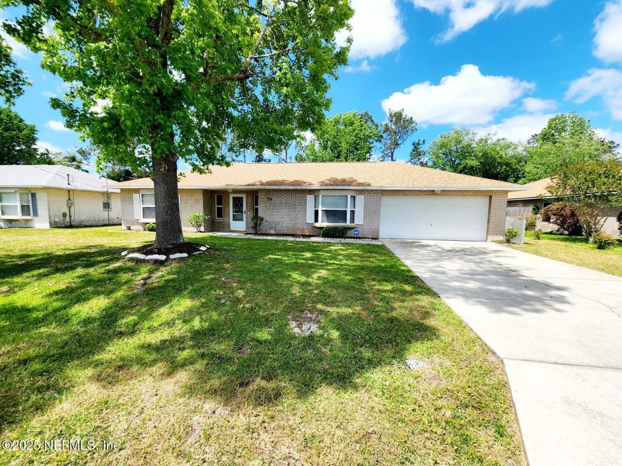 58 Rolling Fern Drive, Palm Coast, FL 32164 Main Photo