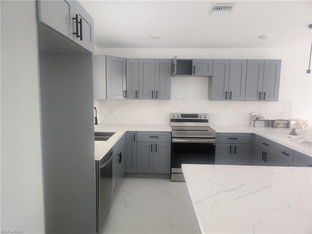 875 Cervantes St E, Lehigh Acres, FL 33974 Photo