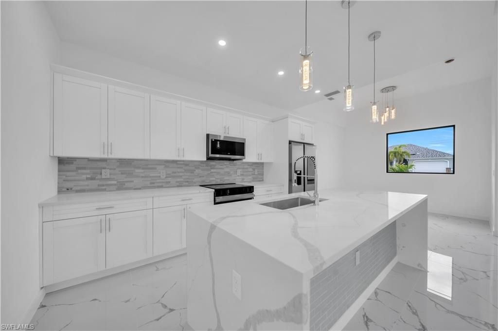 1303 NE 6th Ave, Cape Coral, FL 33909 Photo