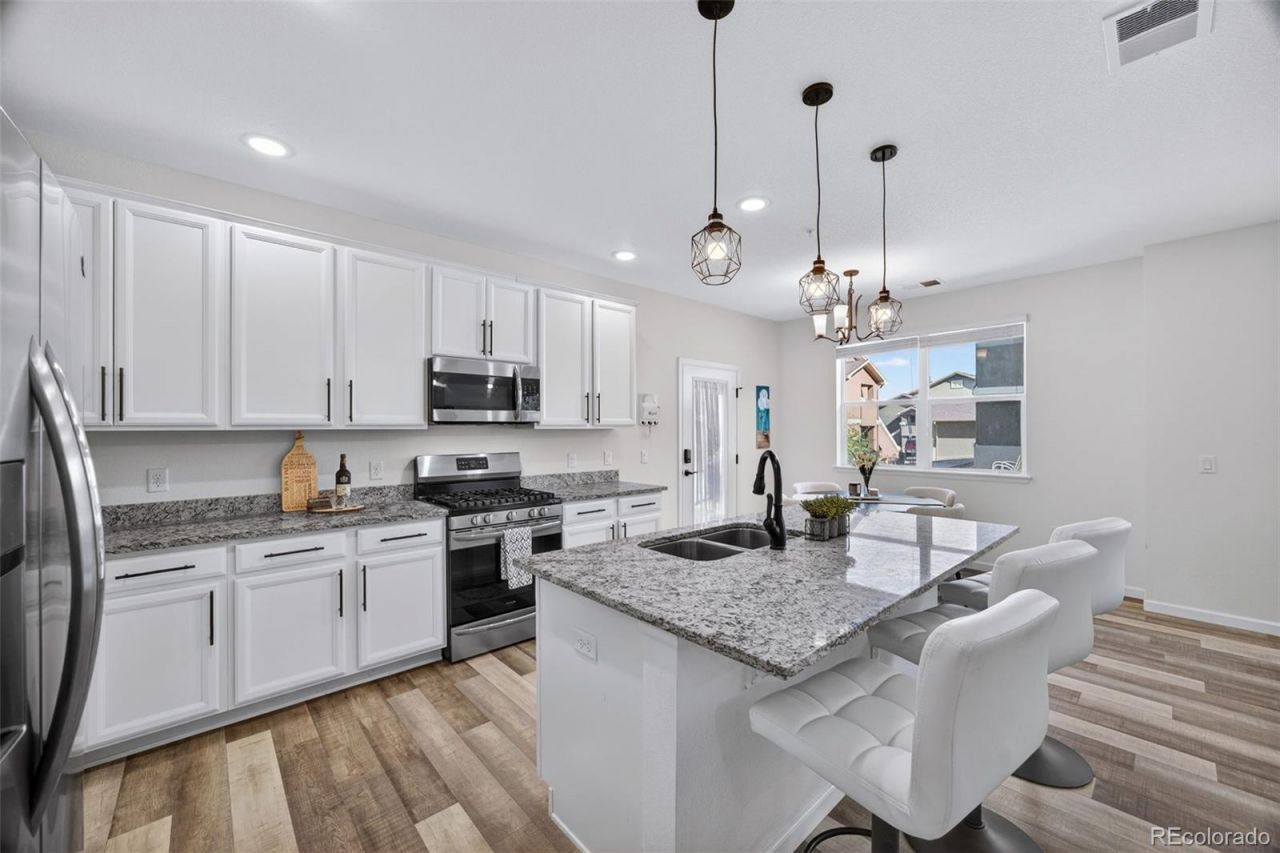4658 Copeland Circle, Unit 103, Highlands Ranch, CO 80126 Main Photo