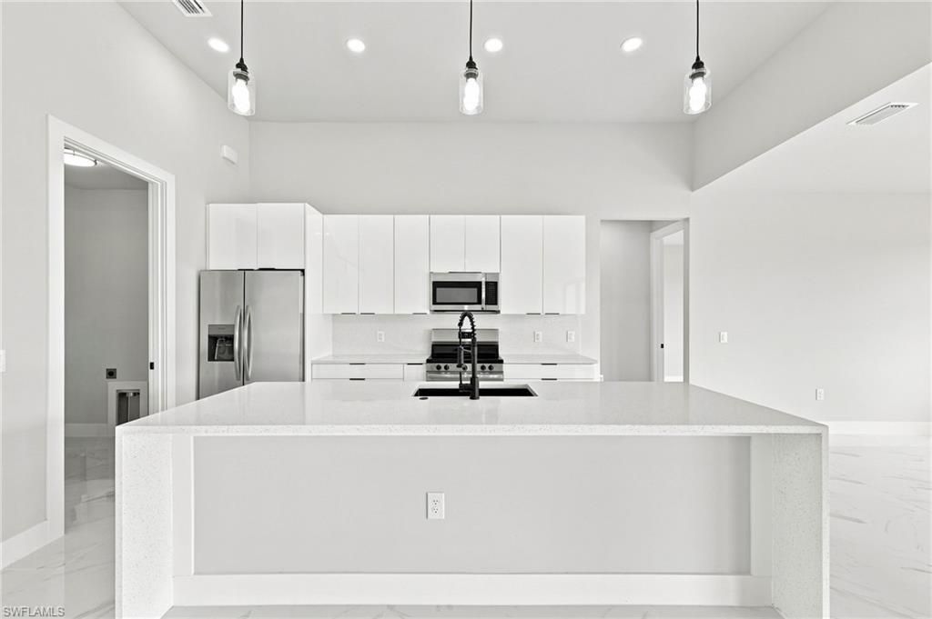 4114 NW 24th Ter, Cape Coral, FL 33993 Photo