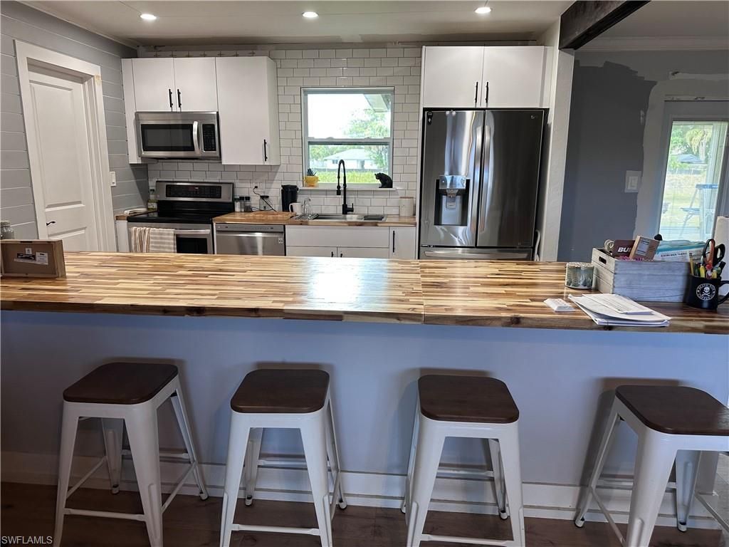 13 E Jasmine Rd , Lehigh Acres, FL 33936 Photo