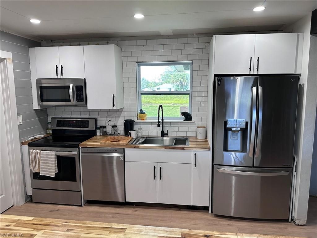 13 E Jasmine Rd , Lehigh Acres, FL 33936 Photo