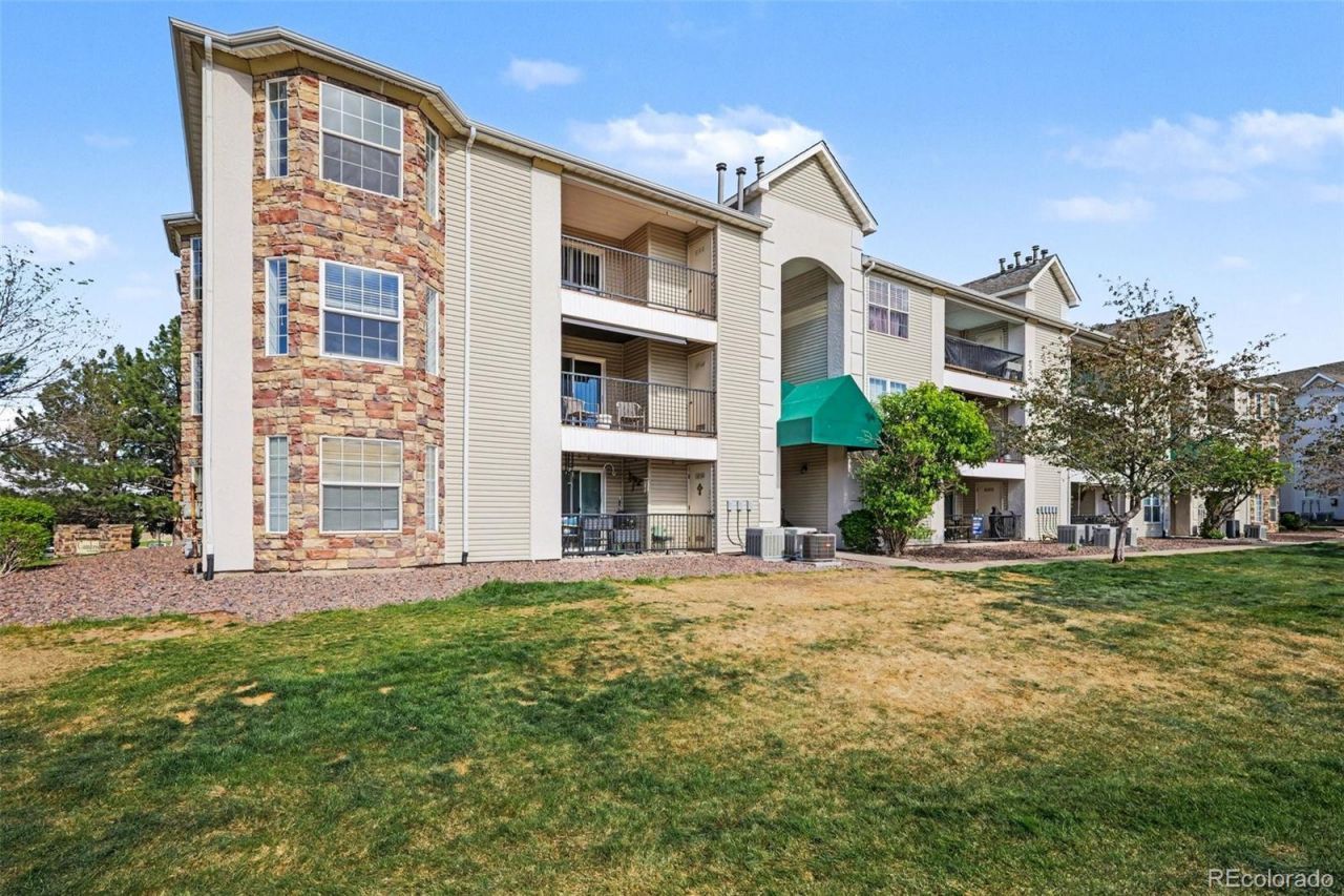 12304 W Cross Drive, Unit 201, Littleton, CO 80127 Main Photo