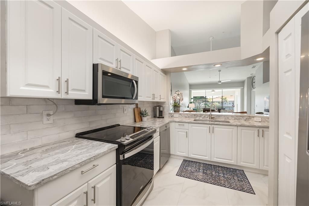 7564 Silver Trumpet Ln , Unit U202, Naples, FL 34109 Photo