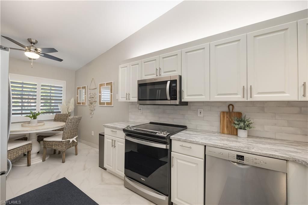 7564 Silver Trumpet Ln , Unit U202, Naples, FL 34109 Photo