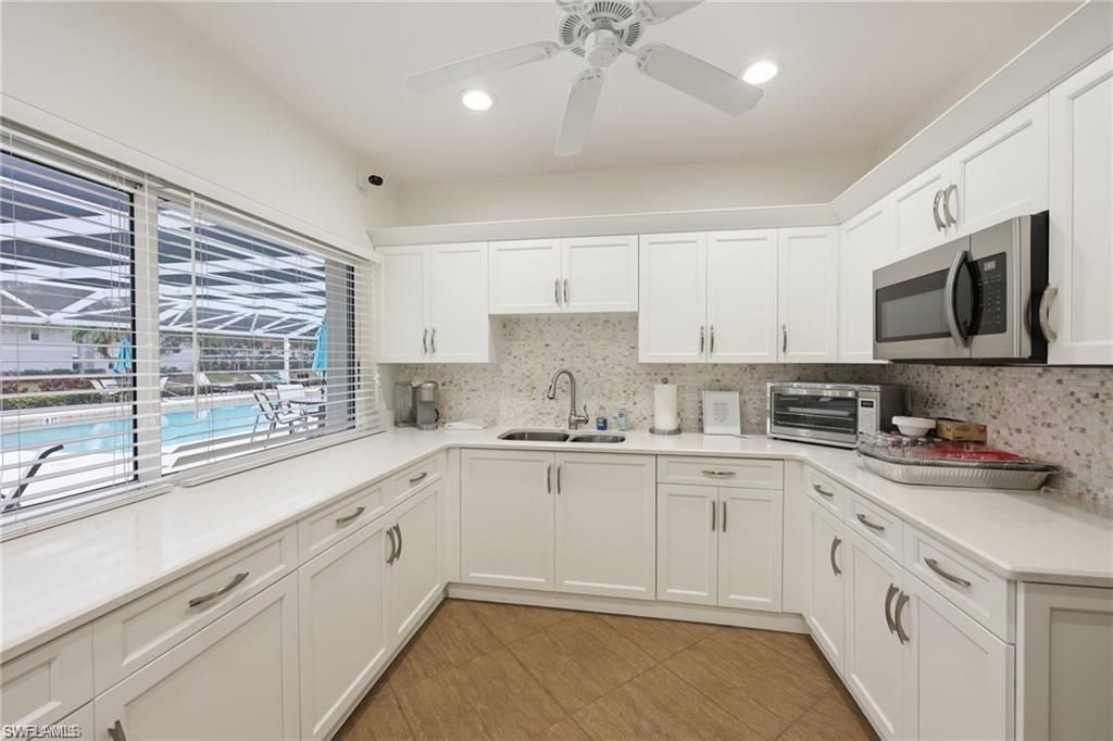 7564 Silver Trumpet Ln , Unit U202, Naples, FL 34109 Photo