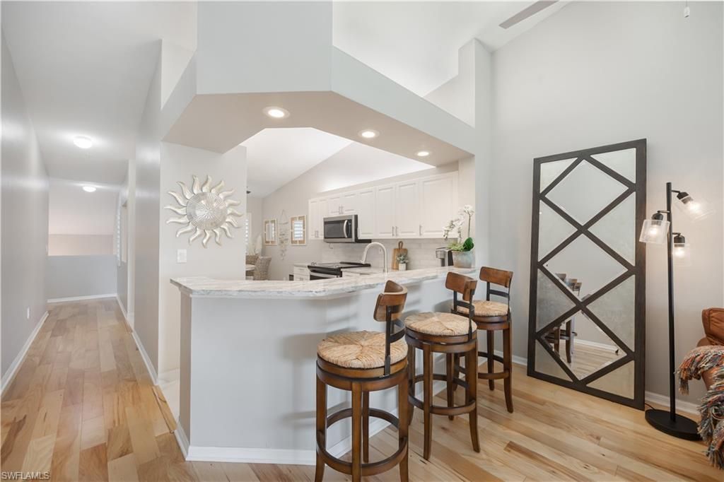 7564 Silver Trumpet Ln , Unit U202, Naples, FL 34109 Photo