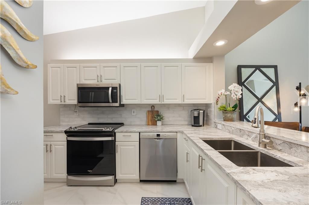 7564 Silver Trumpet Ln , Unit U202, Naples, FL 34109 Photo