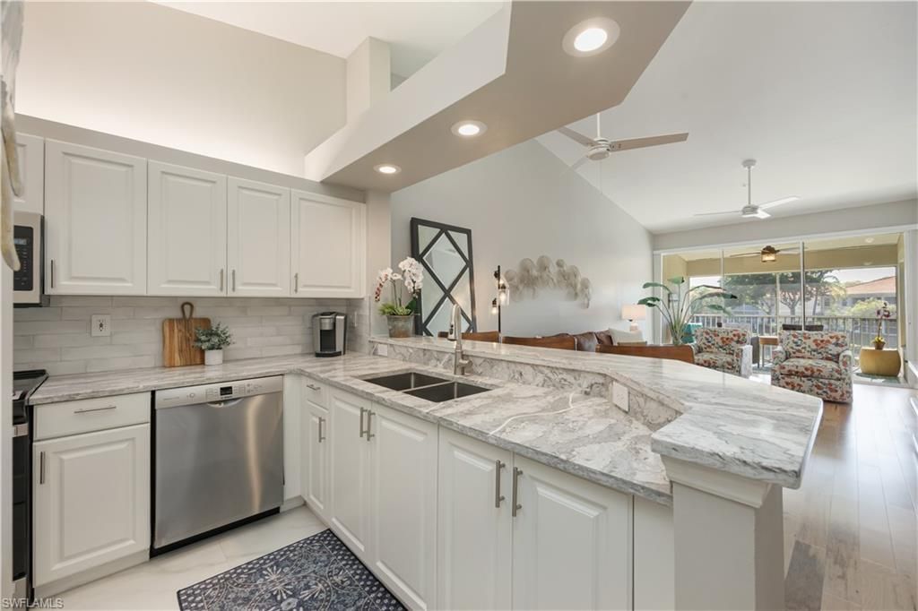7564 Silver Trumpet Ln , Unit U202, Naples, FL 34109 Photo