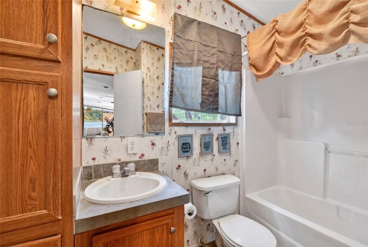 9190 NE 144th Terrace , Silver Springs, FL 34488 Photo
