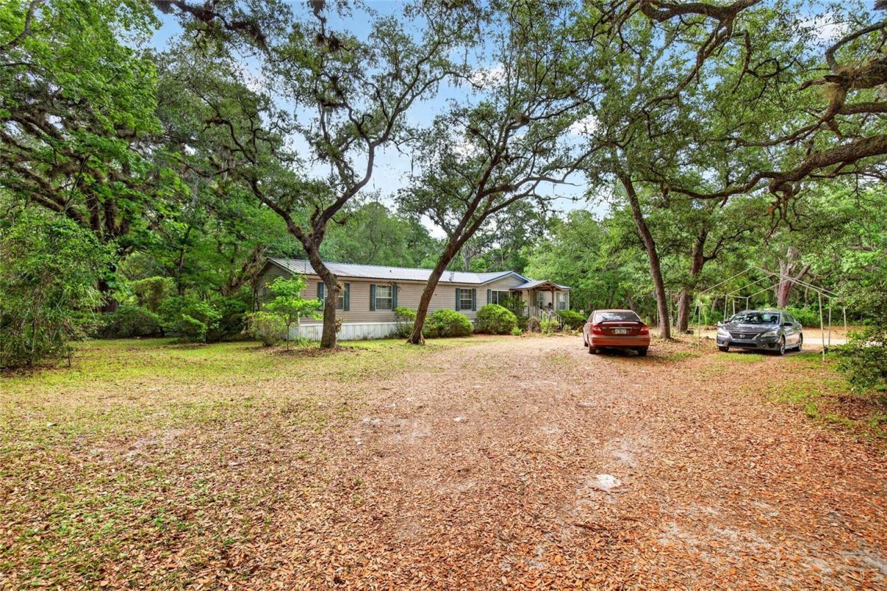 9190 NE 144th Terrace , Silver Springs, FL 34488 Photo