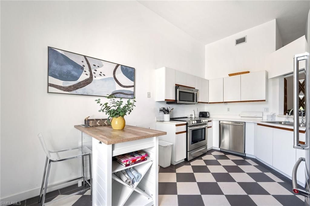577 Beachwalk Cir, Unit R203, Naples, FL 34108 Photo