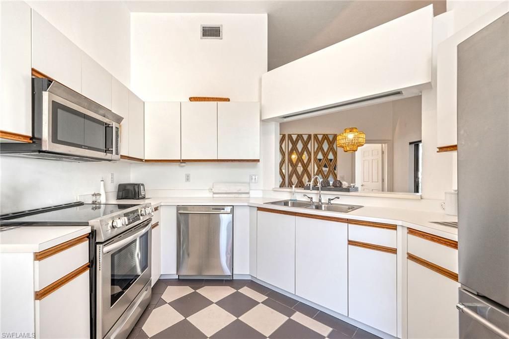 577 Beachwalk Cir, Unit R203, Naples, FL 34108 Photo