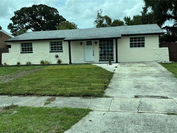6456 WILLOW WOOD LANE, TAMPA, FL 33634