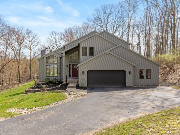 7721 Sun Quest Ridge Drive NE, Ada, MI 49301