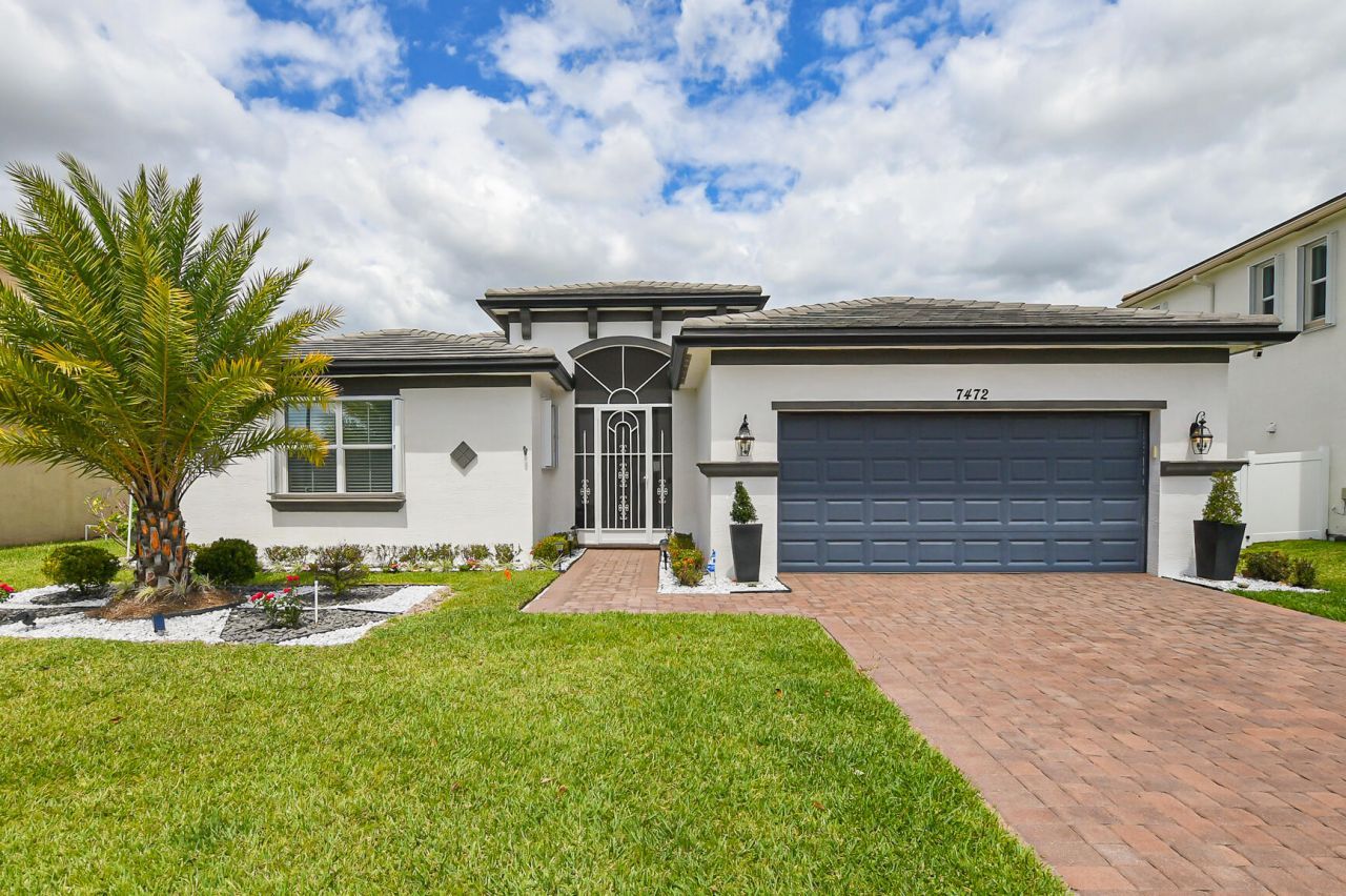 7472 NW Greenspring Street, Port Saint Lucie, FL 34987 Photo