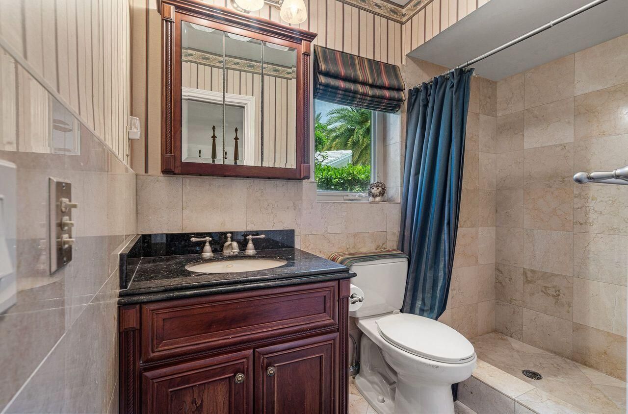 57 Cayuga Road, Sea Ranch Lakes, FL 33308 Photo