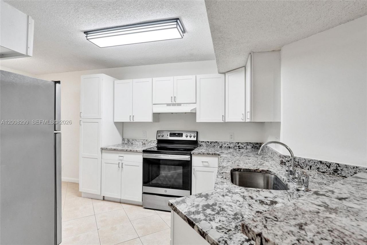 8721 Wiles Rd , Unit 101, Coral Springs, FL 33067 Photo