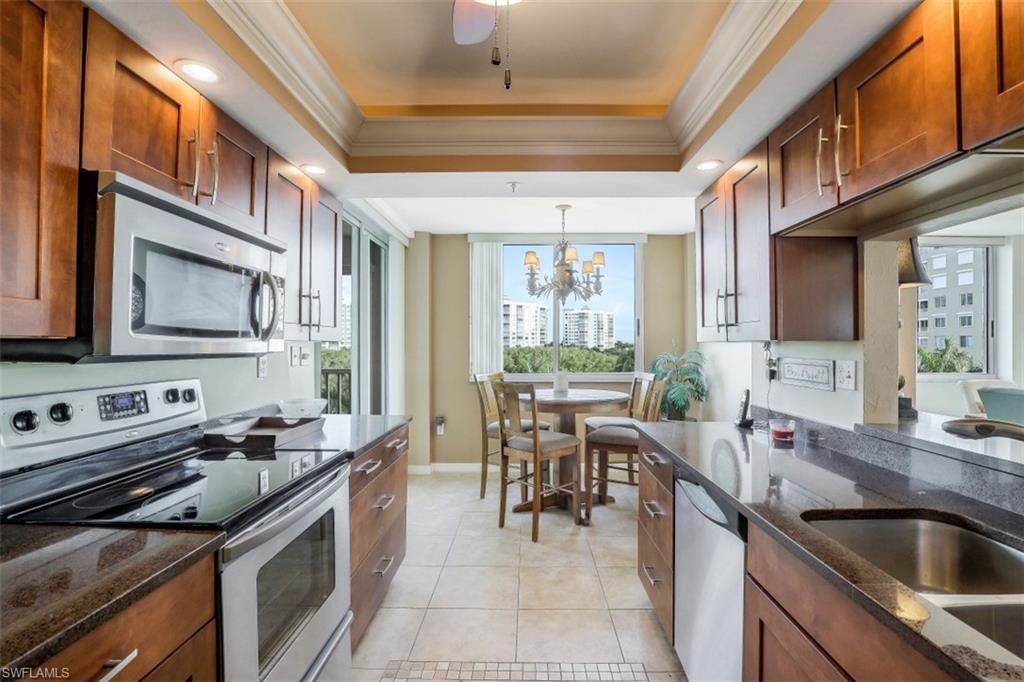 21 Bluebill Ave , Unit B401, Naples, FL 34108 Photo