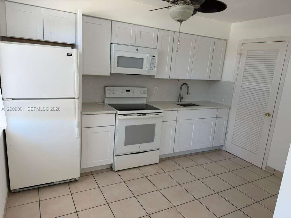 609 NE 6 Th Court, Unit F, Boynton Beach, FL 33435 Photo