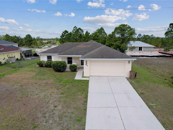 1028 COLUMBUS BOULEVARD S, LEHIGH ACRES, FL 33974