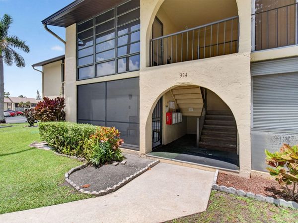 314 Pine Ridge Circle, Unit A1, Greenacres, FL 33463