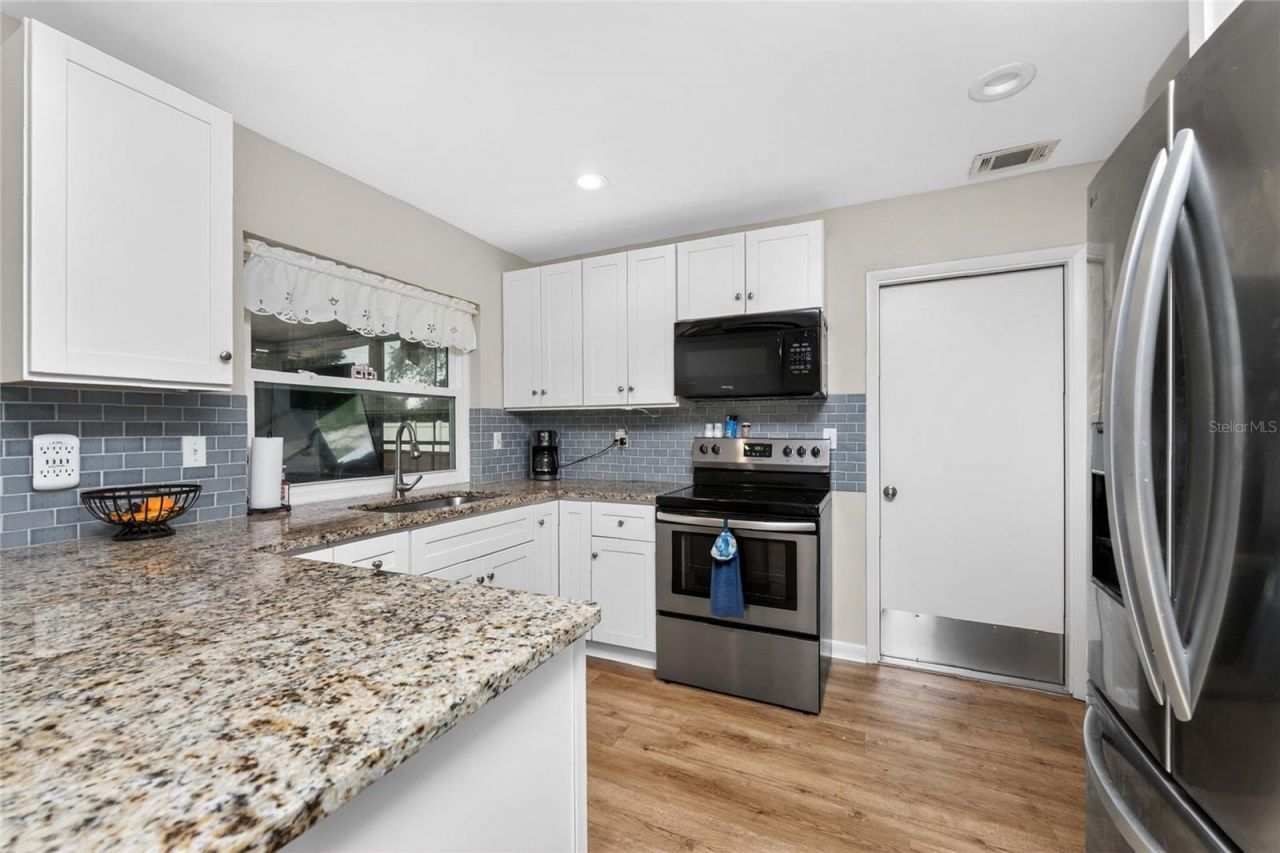 557 Magnolia Avenue Nw, Port Charlotte, FL 33952 Photo
