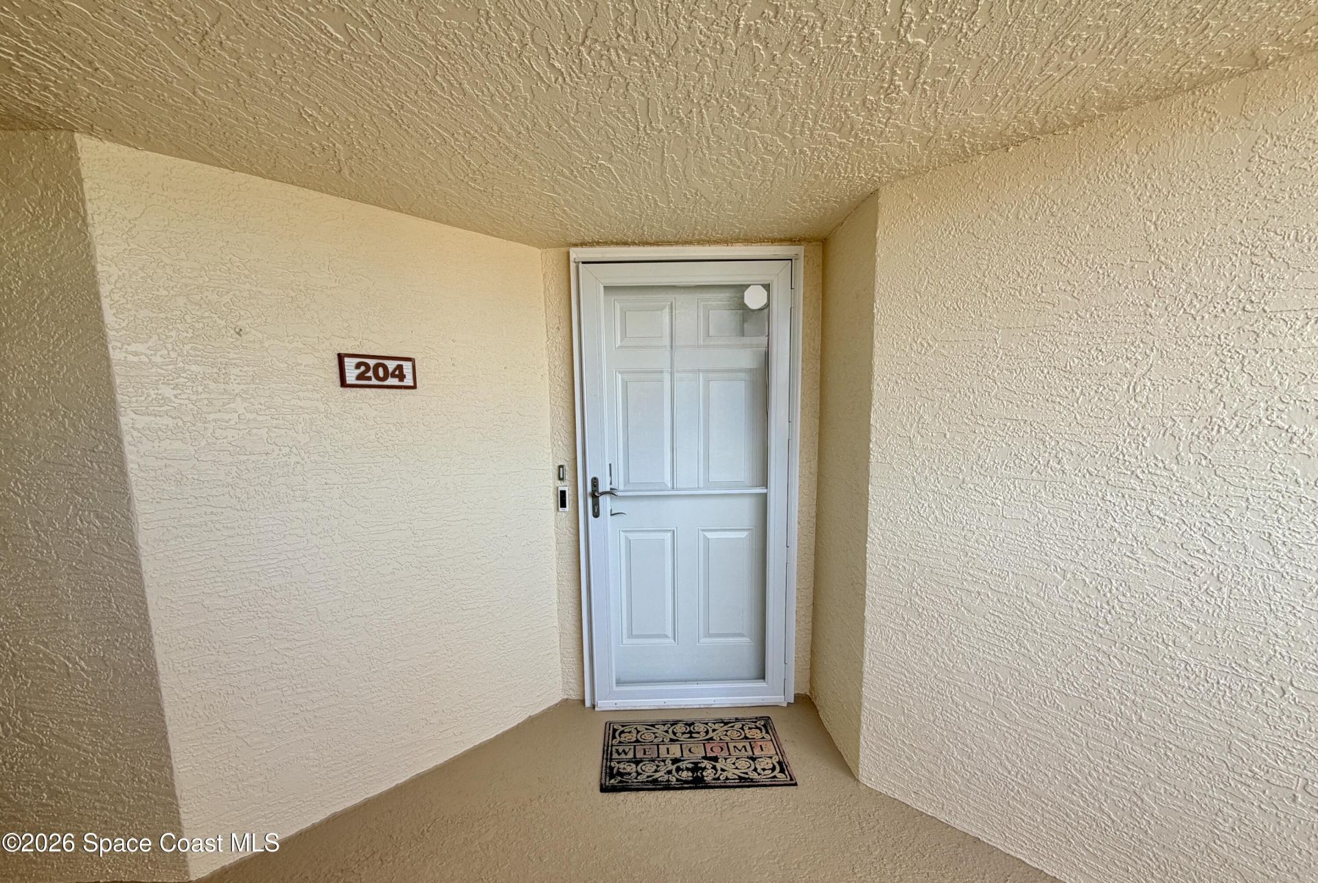 551 Casa Bella Drive, Unit 204, Cape Canaveral, FL 32920 Photo
