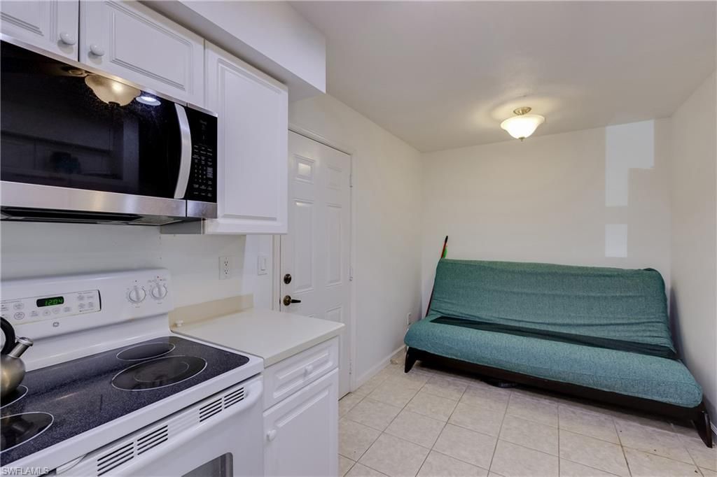 25080 Peacock Ln , Unit 102, Naples, FL 34114 Photo