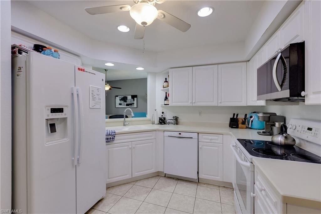 25080 Peacock Ln, Unit 102, Naples, FL 34114 Photo