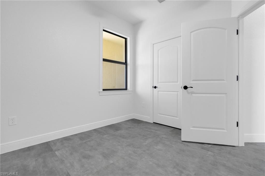 2625/2627 Sunniland Blvd , Lehigh Acres, FL 33971 Photo