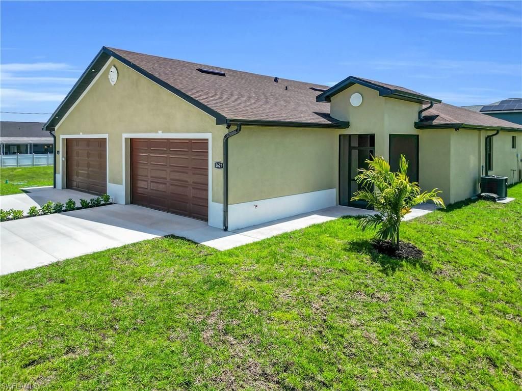 2625/2627 Sunniland Blvd , Lehigh Acres, FL 33971 Photo