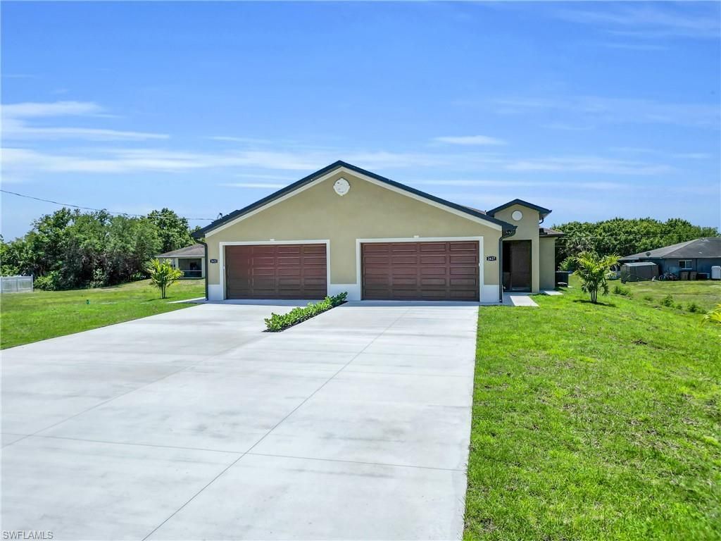 2625/2627 Sunniland Blvd , Lehigh Acres, FL 33971 Photo