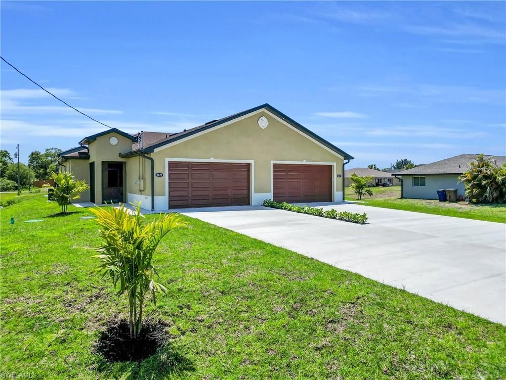 2625/2627 Sunniland Blvd , Lehigh Acres, FL 33971 Photo