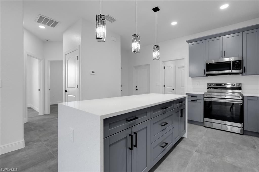 2625/2627 Sunniland Blvd , Lehigh Acres, FL 33971 Photo