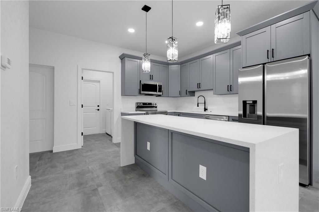 2625/2627 Sunniland Blvd , Lehigh Acres, FL 33971 Photo
