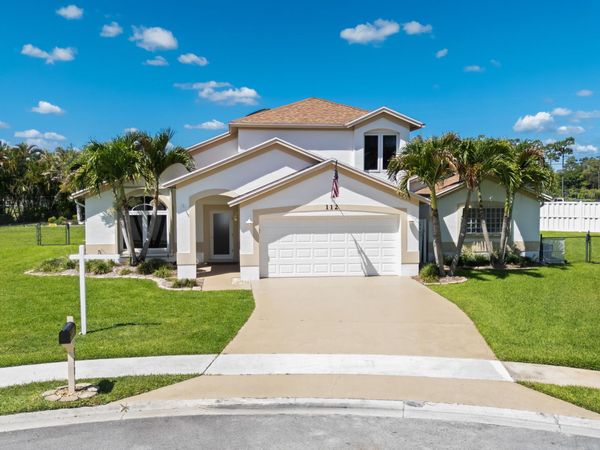 112 Camelot Court, Royal Palm Beach, FL 33411