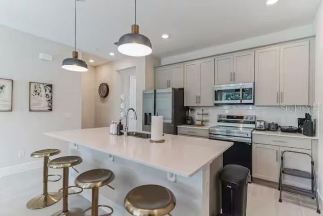 7842 Spectrum Drive , Reunion, FL 34747 Photo