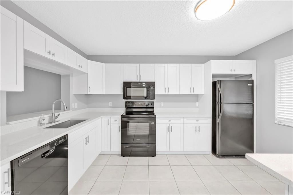 7791 Esmeralda Way, Unit L103, Naples, FL 34109 Photo