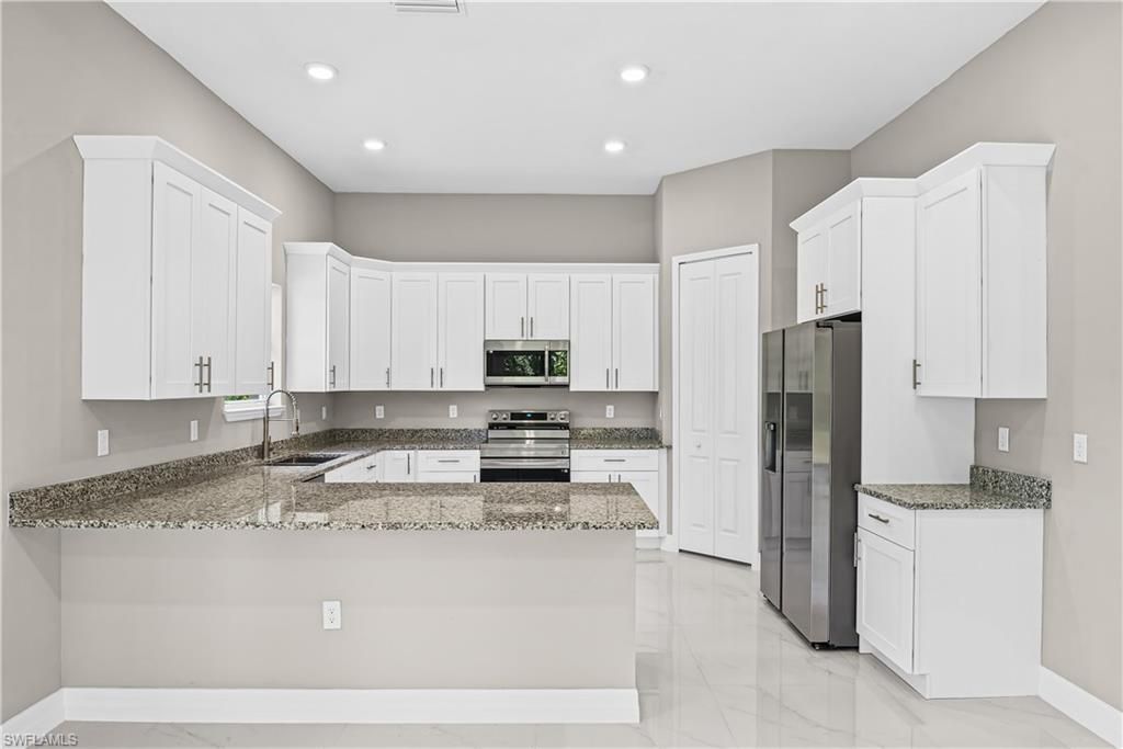 1032 Milwaukee Blvd , Lehigh Acres, FL 33974 Photo