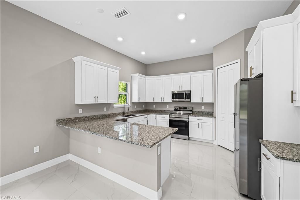 1032 Milwaukee Blvd , Lehigh Acres, FL 33974 Photo