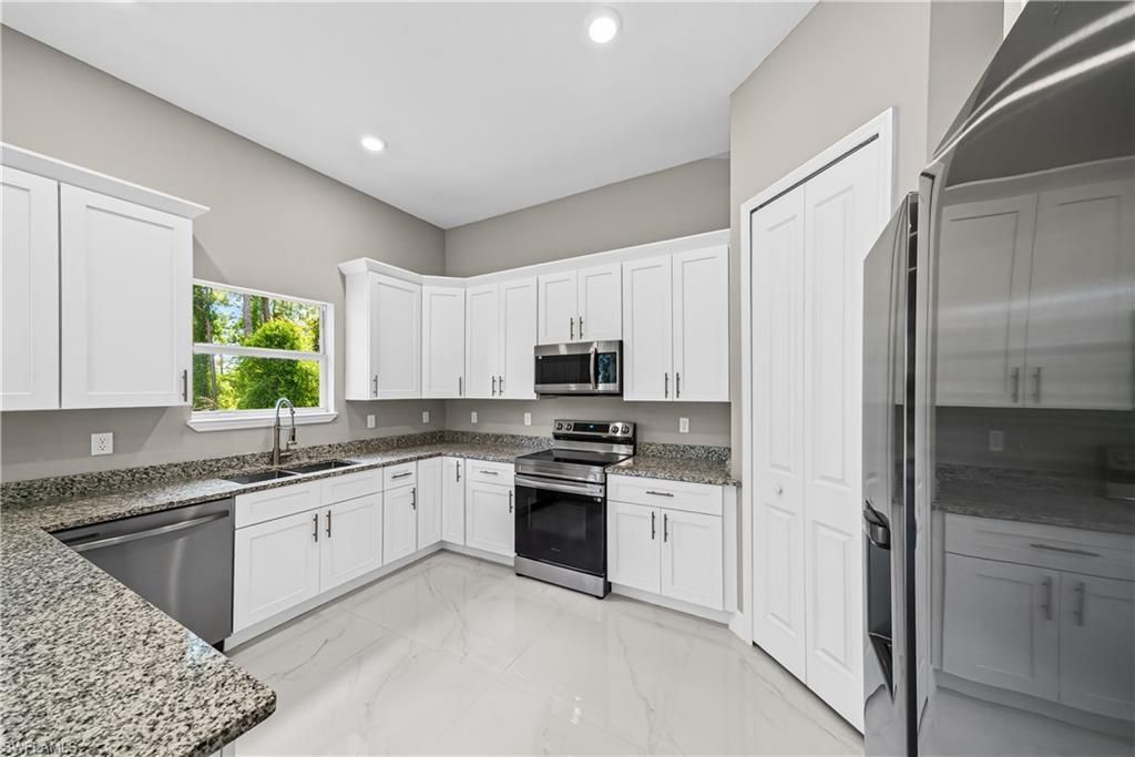 1032 Milwaukee Blvd , Lehigh Acres, FL 33974 Photo
