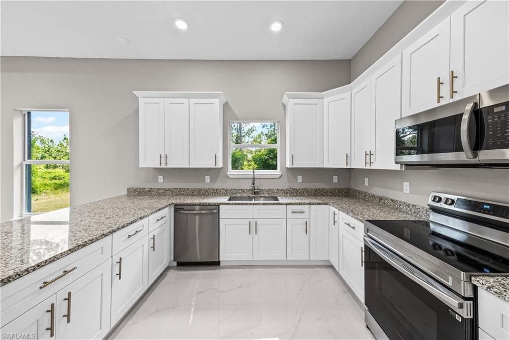 1032 Milwaukee Blvd , Lehigh Acres, FL 33974 Photo