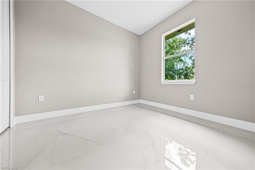 1032 Milwaukee Blvd , Lehigh Acres, FL 33974 Photo